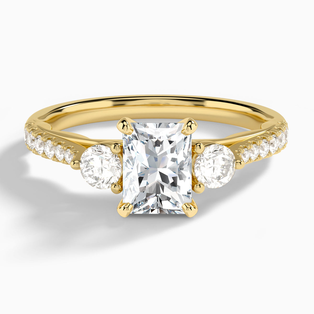 Radiant Tressa Three Stone Lab Diamond Engagement Ring In 18K Yellow Gold - Lucenjuri