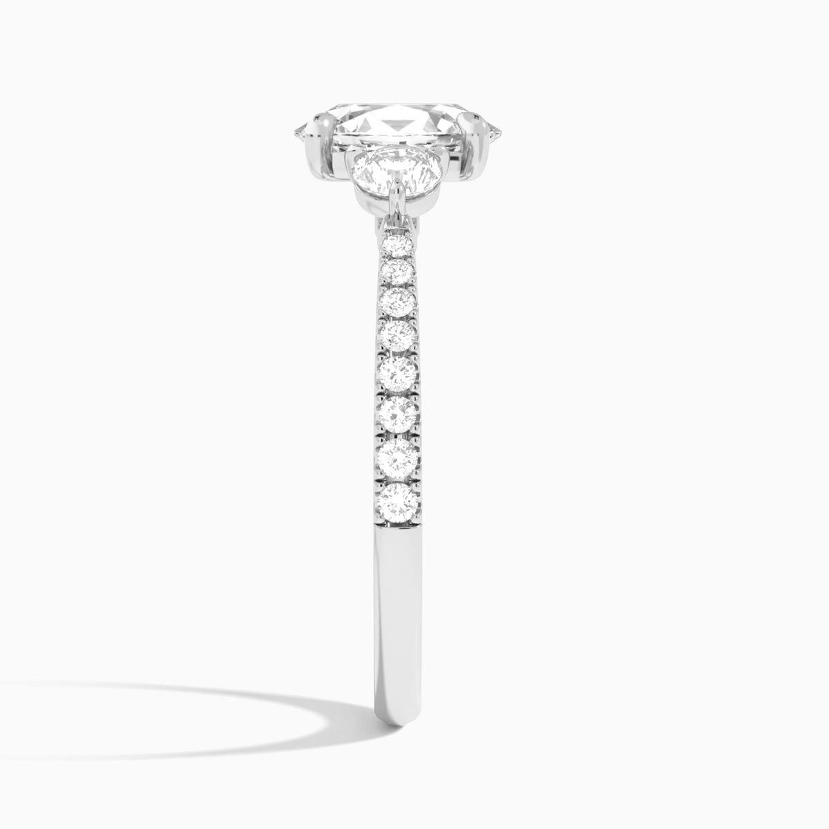 Oval Luxe Three Stone Pavé Lab Diamond Engagement Ring In Platinum, Side View