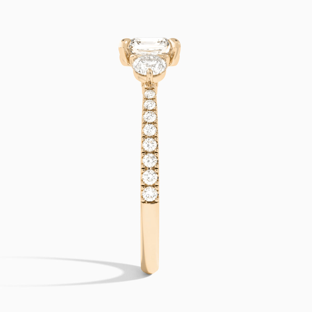 Asscher Luxe Three Stone Pavé Lab Diamond Engagement Ring In 14K Rose Gold, Side View