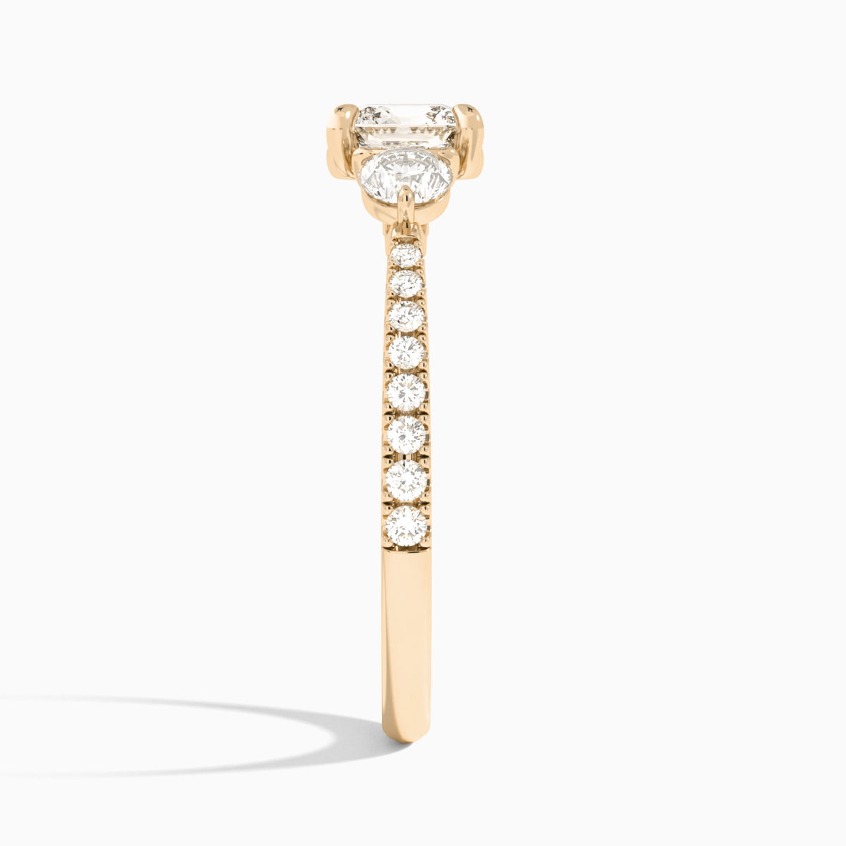 Cushion Luxe Three Stone Pavé Lab Diamond Engagement Ring In 14K Rose Gold, Side View