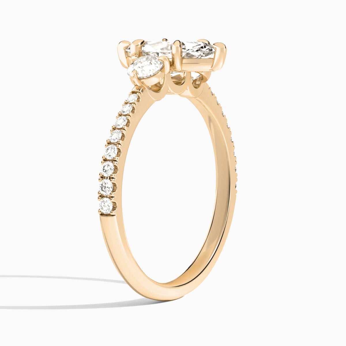 Marquise Luxe Three Stone Pavé Lab Diamond Engagement Ring In 14K Rose Gold, Angle View