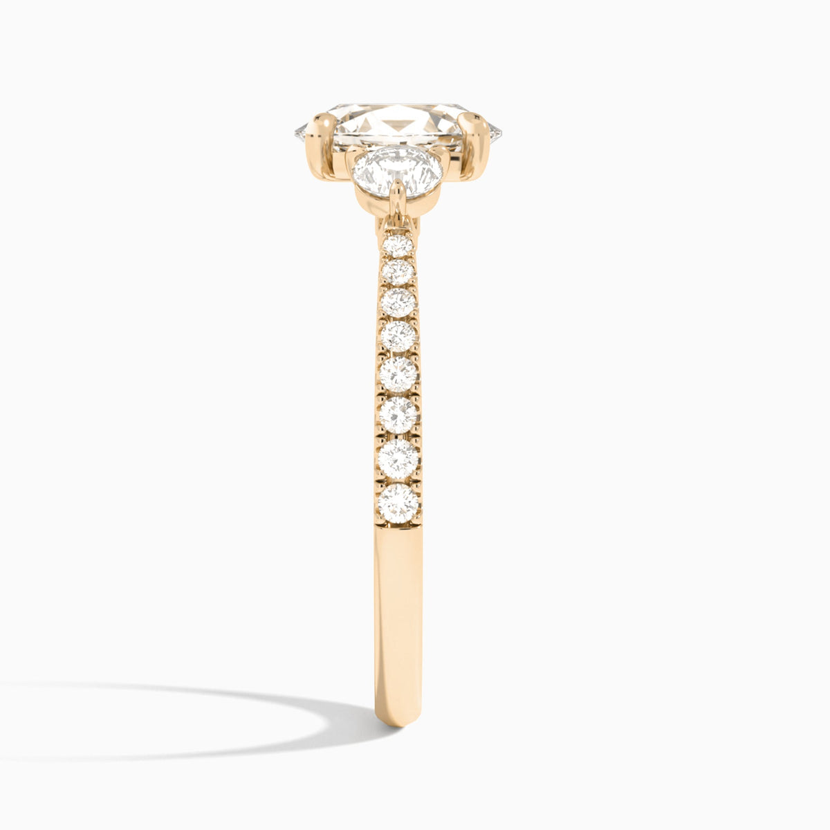 Oval Luxe Three Stone Pavé Lab Diamond Engagement Ring In 14K Rose Gold, Side View