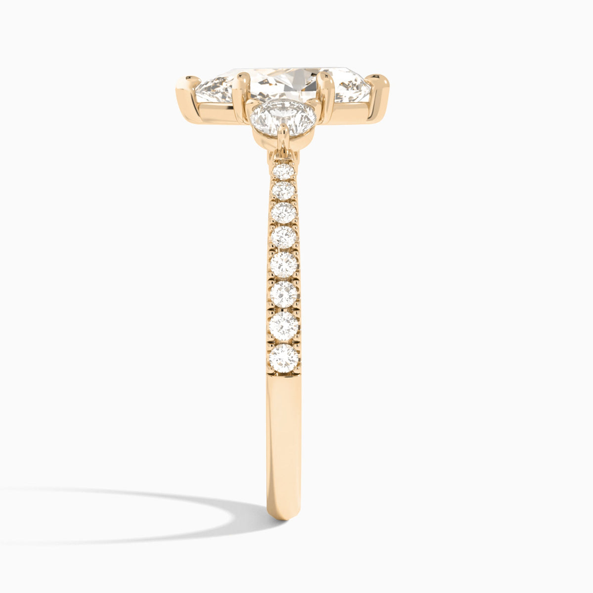 Pear Luxe Three Stone Pavé Lab Diamond Engagement Ring In 14K Rose Gold, Side View