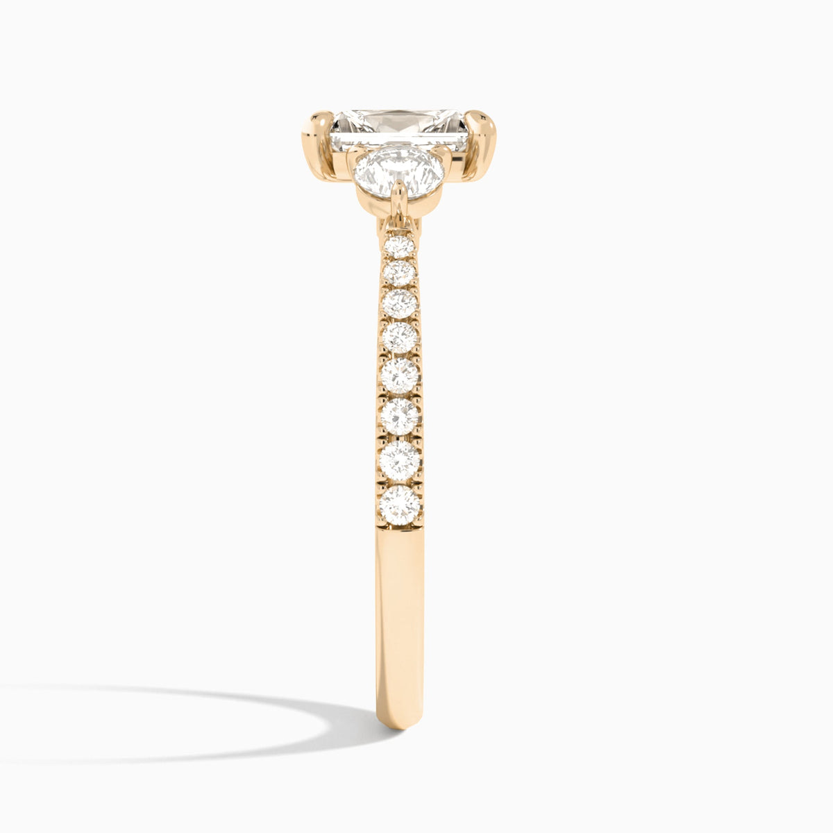 Radiant Luxe Three Stone Pavé Lab Diamond Engagement Ring In 14K Rose Gold, Side View