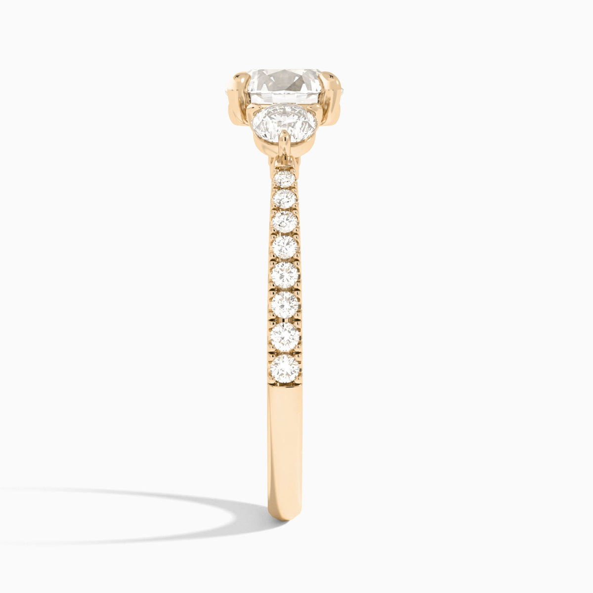Round Luxe Three Stone Pavé Lab Diamond Engagement Ring In 14K Rose Gold, Side View