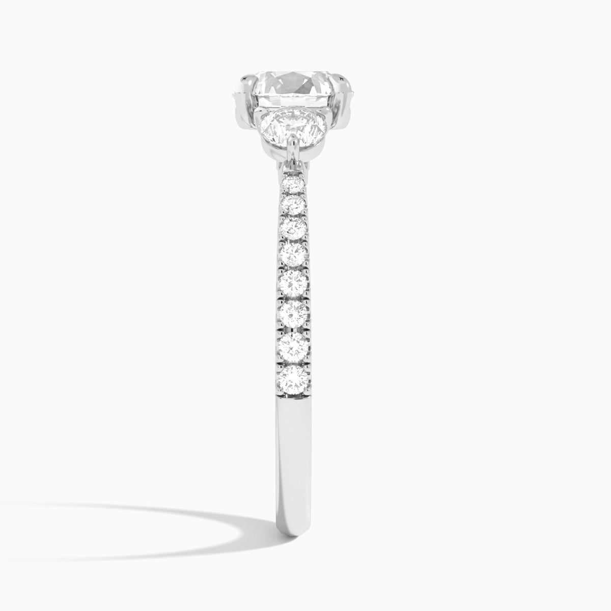 Round Luxe Three Stone Pavé Lab Diamond Engagement Ring In 18K White Gold, Side View