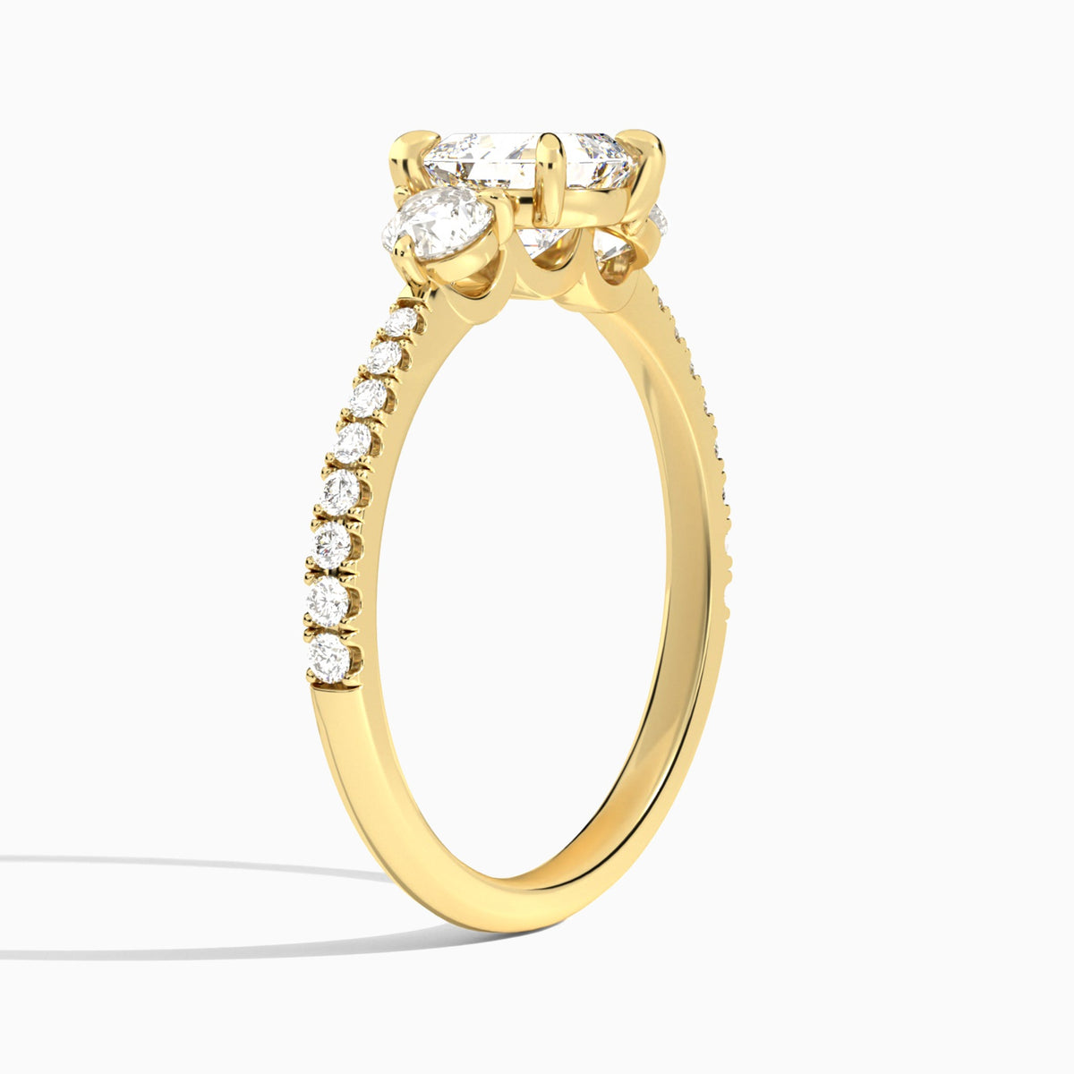Asscher Luxe Three Stone Pavé Lab Diamond Engagement Ring In 18K Yellow Gold, Angle View