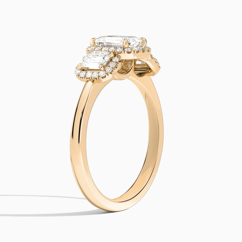 Emerald Luxe Three Stone Halo Lab Diamond Engagement Ring In 14K Rose Gold, Angle View
