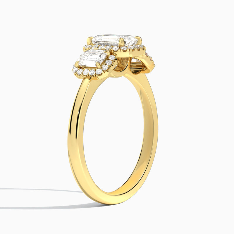 Emerald Luxe Three Stone Halo Lab Diamond Engagement Ring In 14K Yellow Gold, Angle View