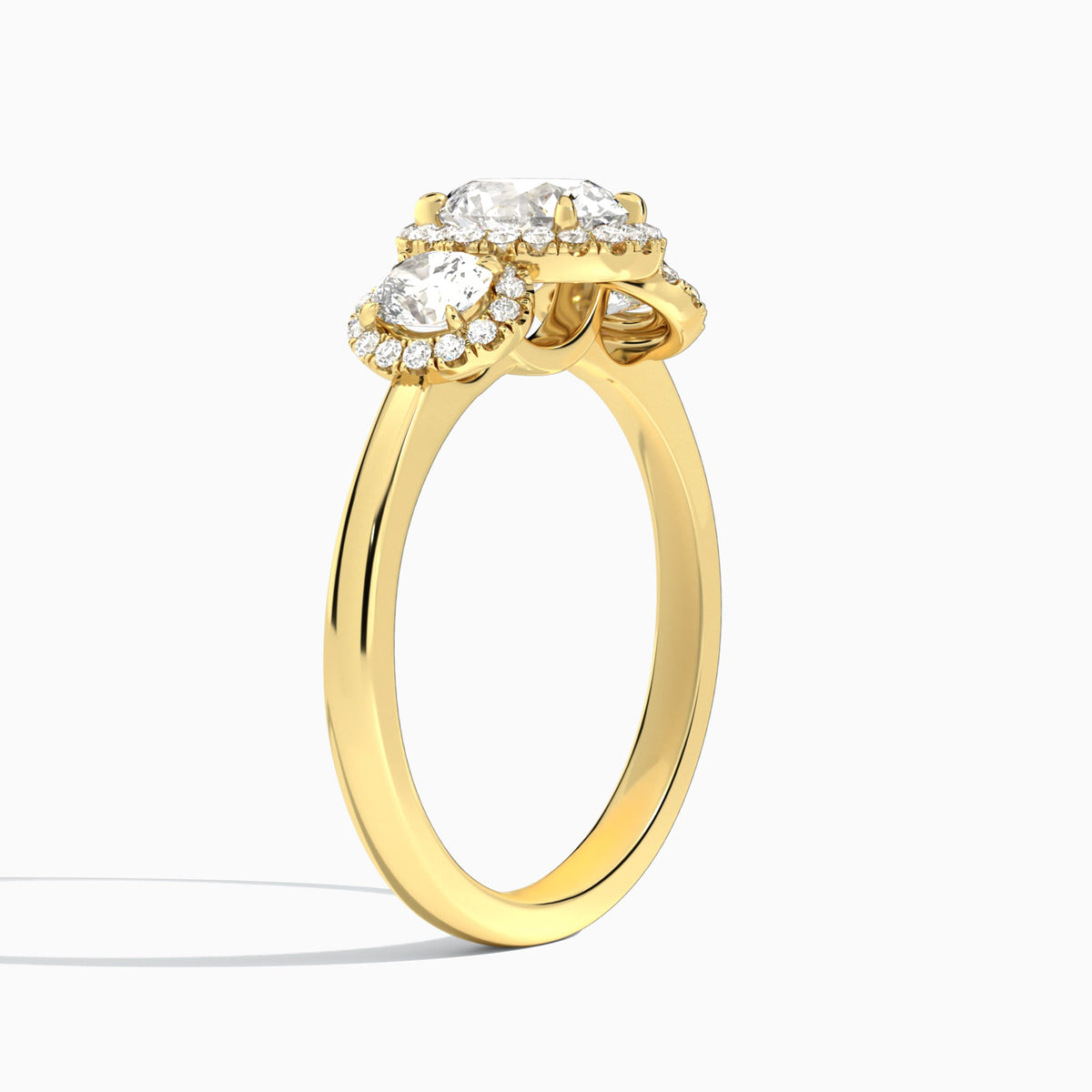 Oval Luxe Three Stone Halo Lab Diamond Engagement Ring In 18K Yellow Gold, Angle View