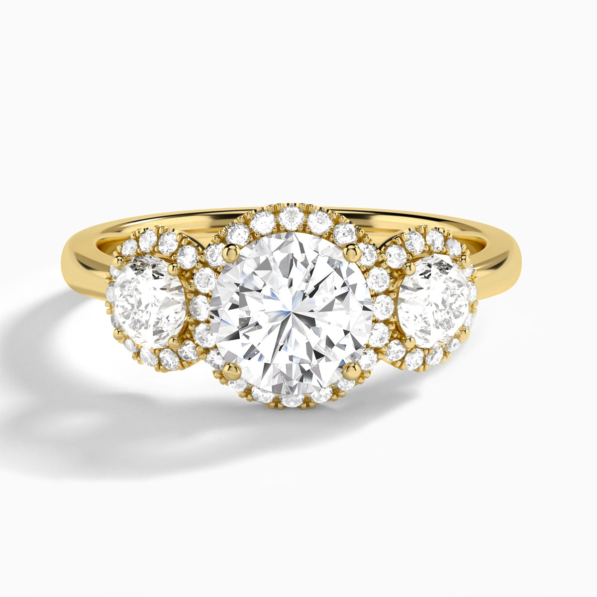 Round Luxe Three Stone Halo Lab Diamond Engagement Ring In 18K Yellow Gold - Lucenjuri