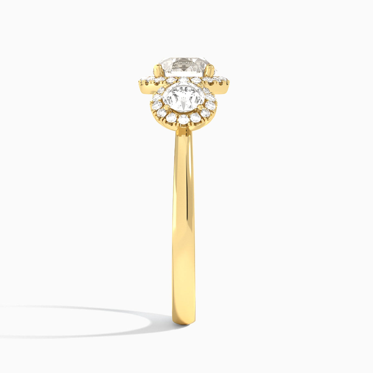 Round Luxe Three Stone Halo Lab Diamond Engagement Ring In 18K Yellow Gold, Side View
