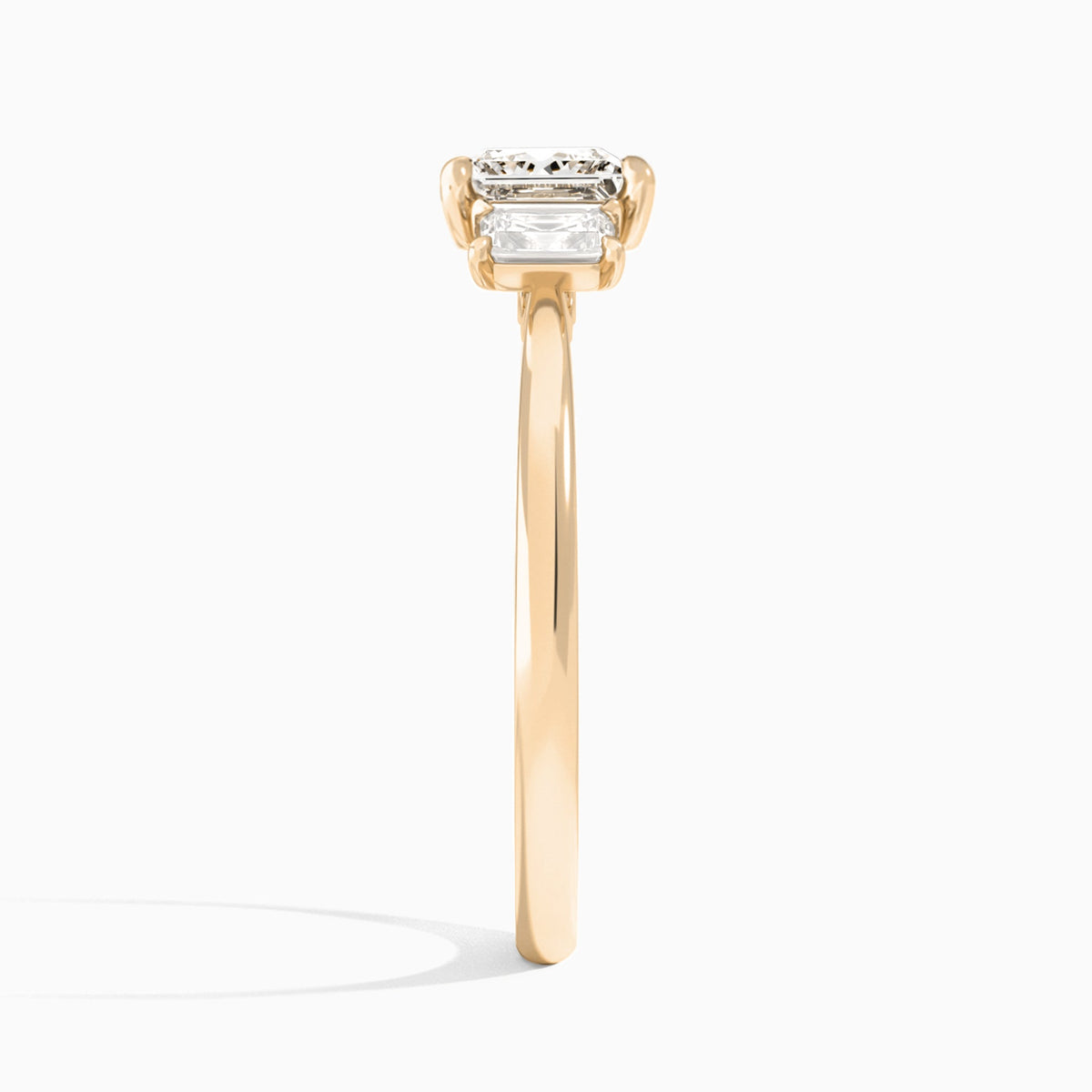 Princess Three Stone Emerald Lab Diamond Engagement Ring In 14K Rose Gold, Side View