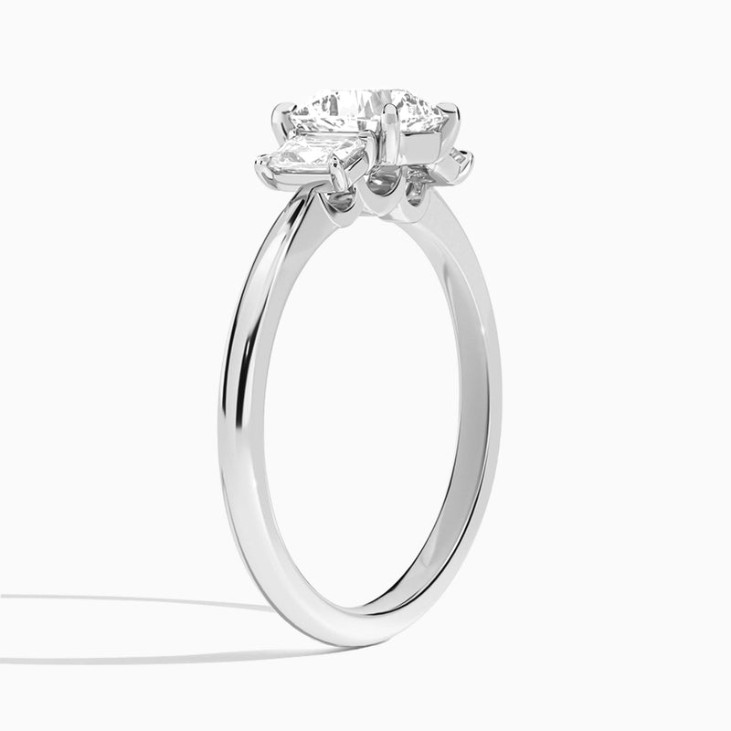 Cushion Three Stone Emerald Lab Diamond Engagement Ring In 18K White Gold, Angle View