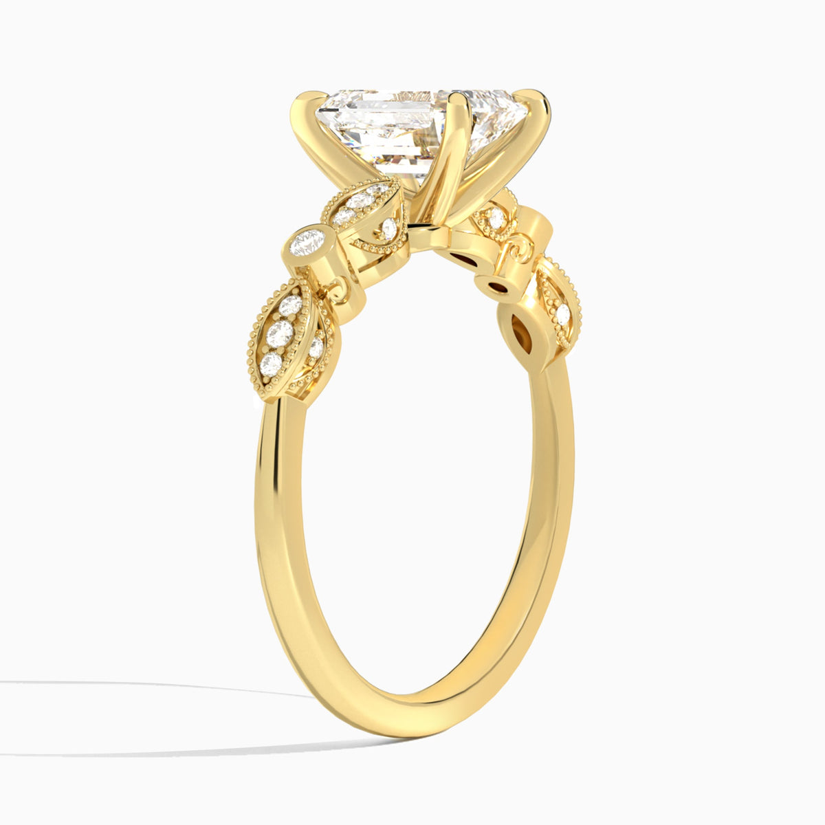 Emerald Infinito Bezel And Pavé Set Engagement Ring In 18K Yellow Gold, Angle View
