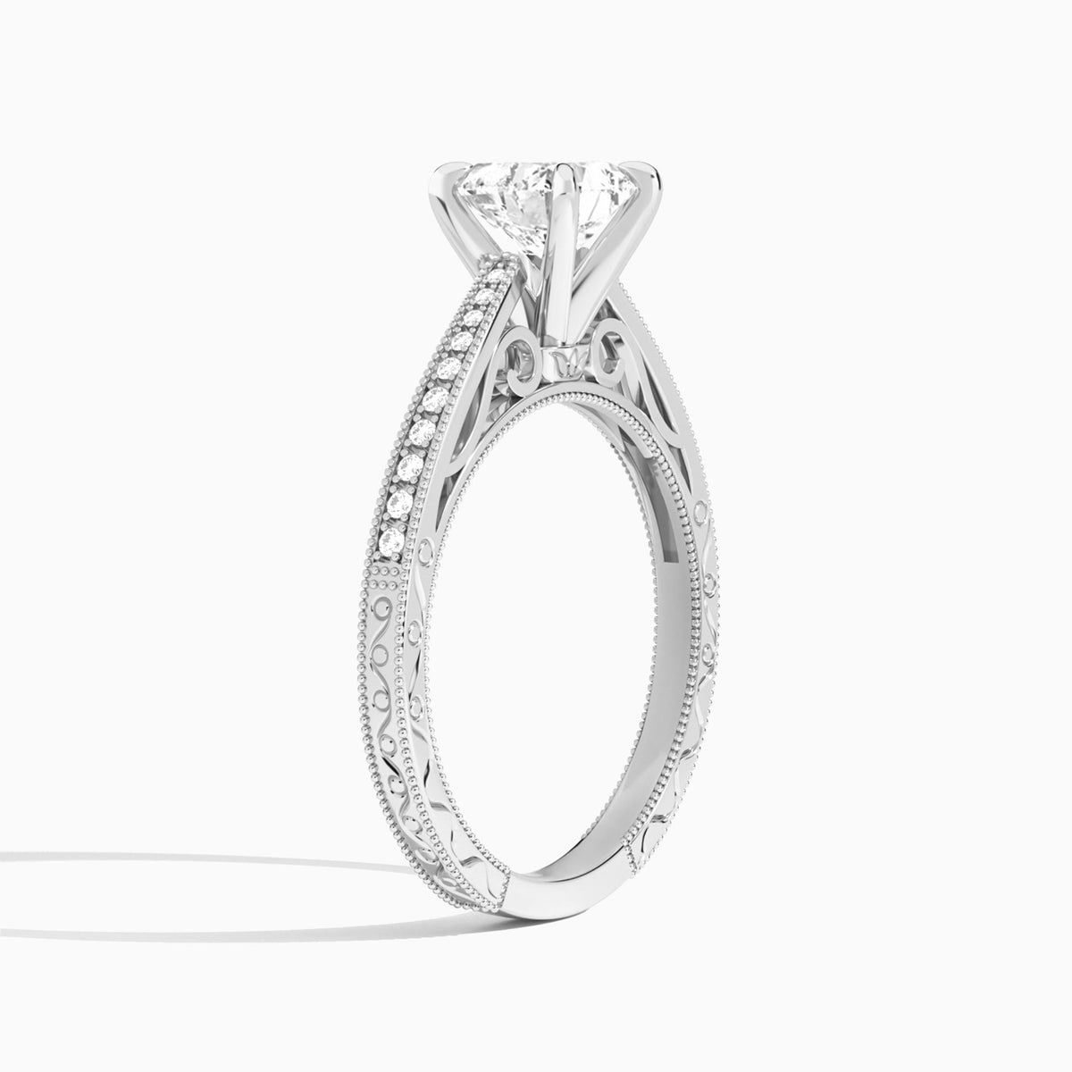 Heart Engraved And Pavé Lab Grown Diamond Engagement Ring In Platinum, Angle View