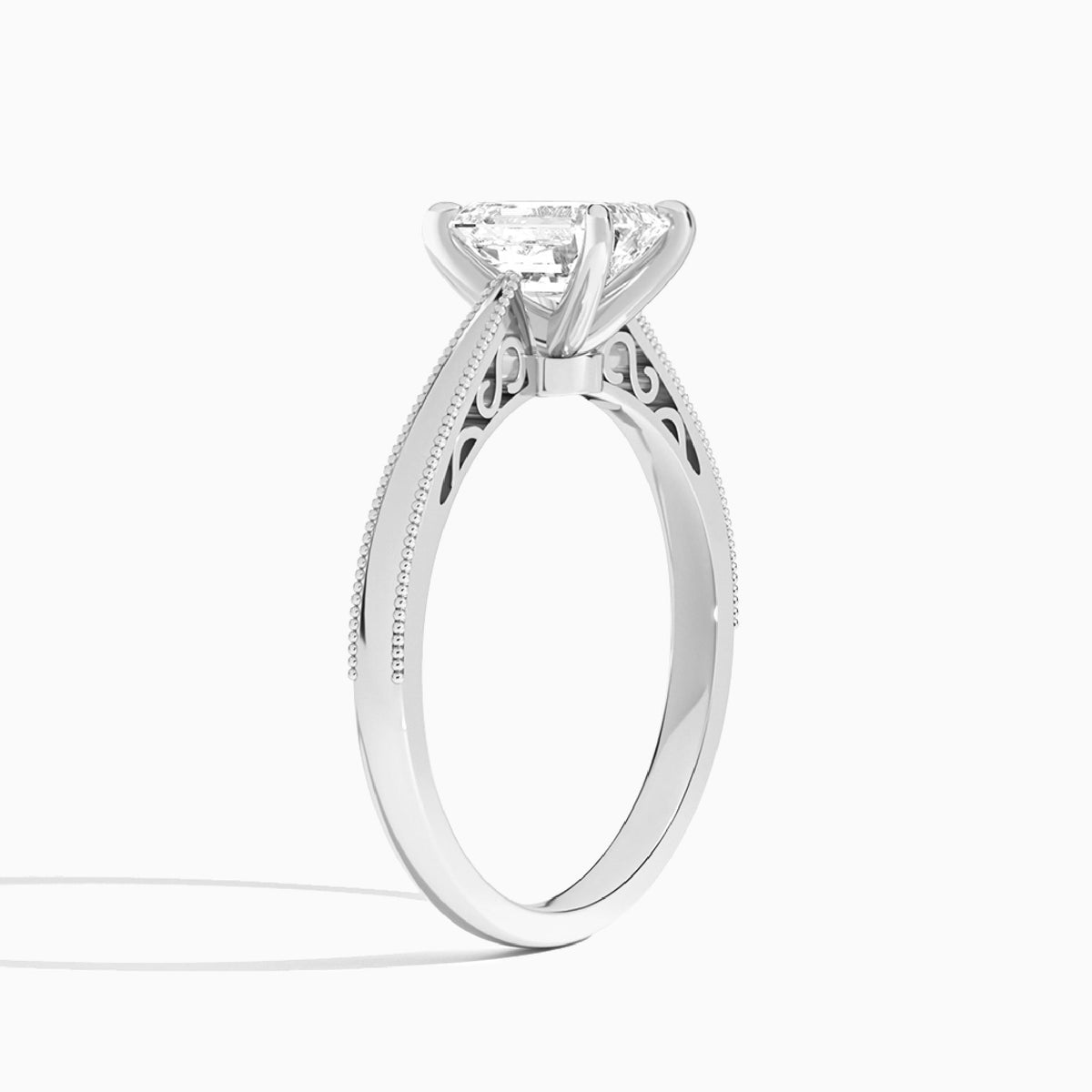 Emerald Engraved Lab Grown Solitaire Diamond Engagement Ring In Platinum, Angle View