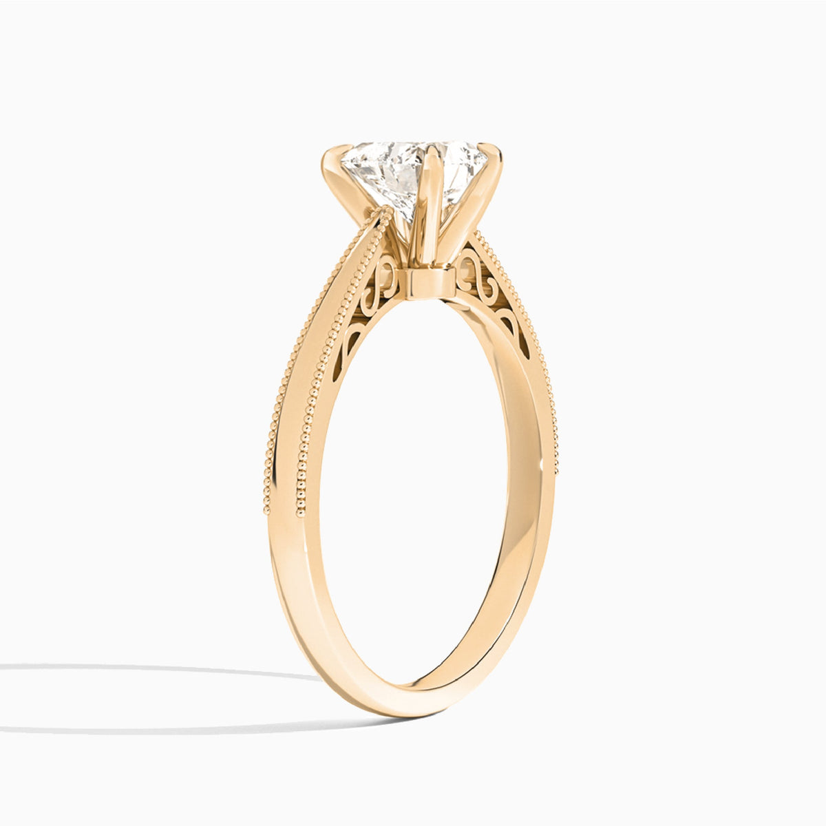 Heart Engraved Lab Grown Solitaire Diamond Engagement Ring In 14K Rose Gold, Angle View