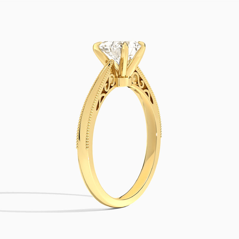 Heart Engraved Lab Grown Solitaire Diamond Engagement Ring In 14K Yellow Gold, Angle View