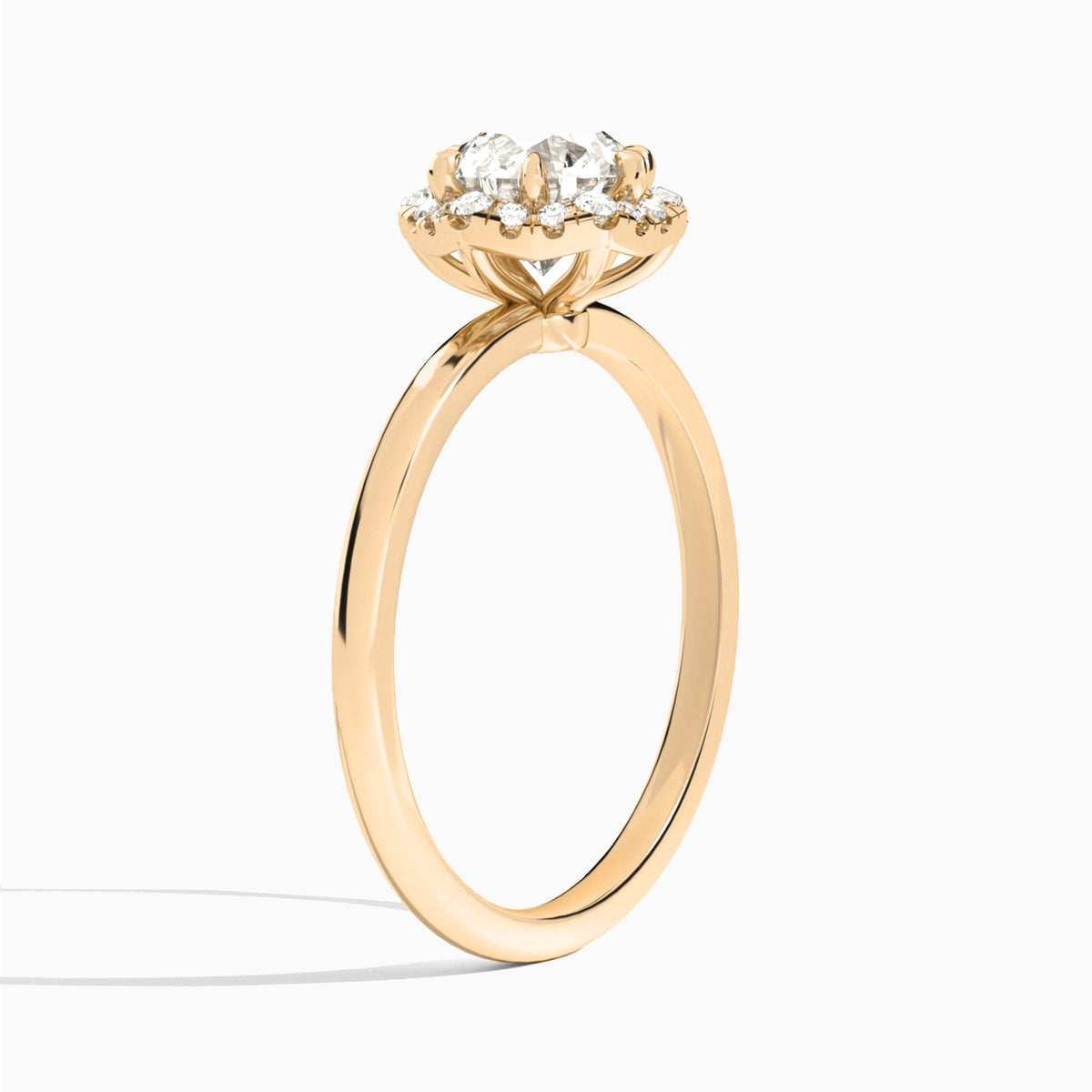 Round Eliza Halo Lab Grown Diamond Engagement Ring In 14K Rose Gold, Angle View