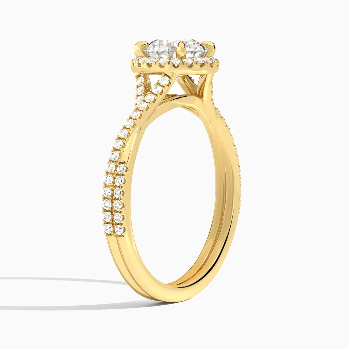 Round Luxe Halo And Twisted Shank Lab Diamond Engagement Ring In 18K Yellow Gold, Angle View