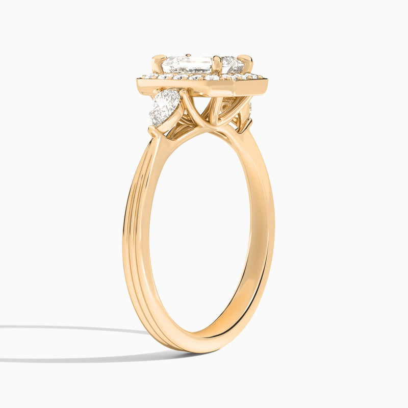 Emerald Halo Shaped Side Stone Lab Diamond Engagement Ring In 14K Rose Gold, Angle View