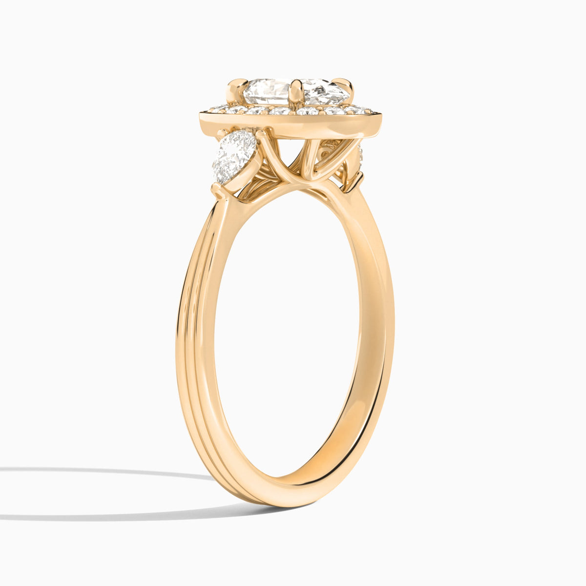 Oval Halo Shaped Side Stone Lab Diamond Engagement Ring In 14K Rose Gold, Angle View