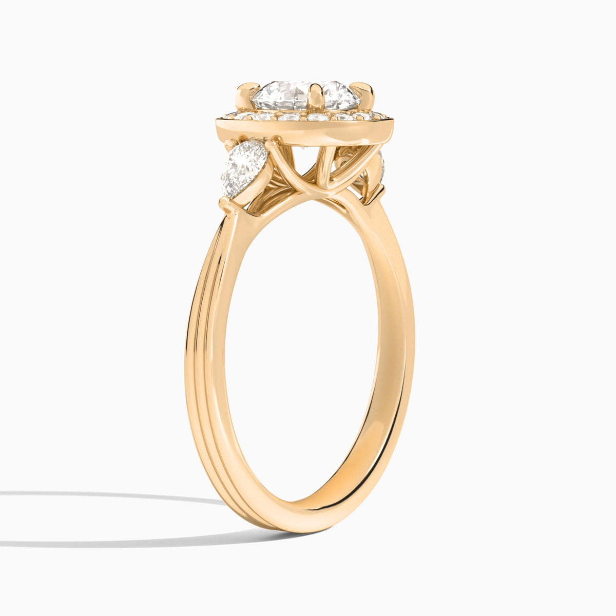 Round Halo Shaped Side Stone Lab Diamond Engagement Ring In 14K Rose Gold, Angle View