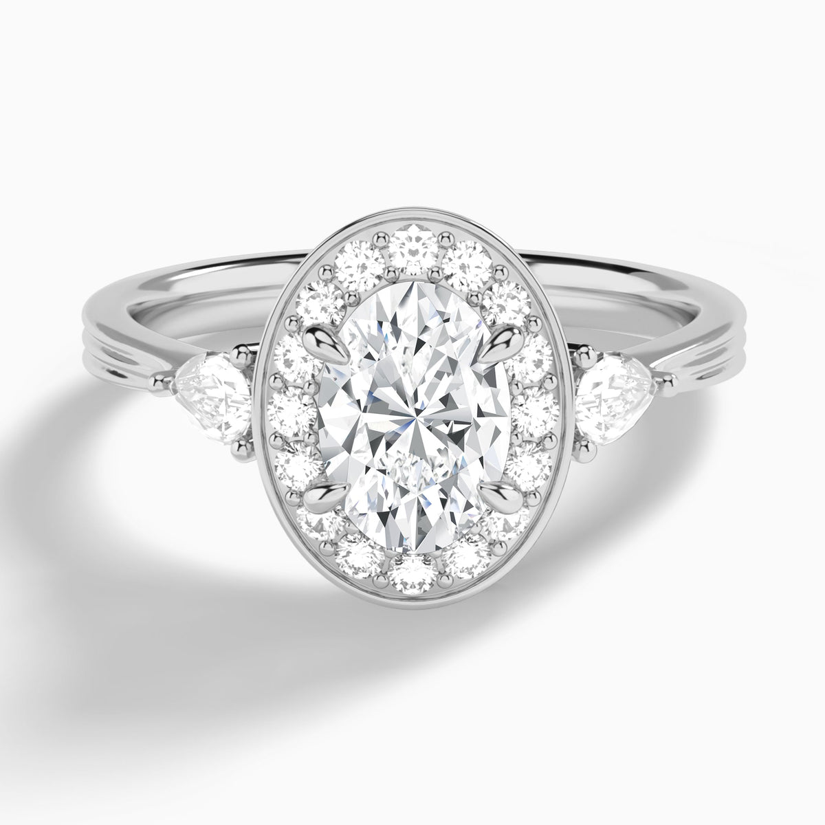 Oval Halo Shaped Side Stone Lab Diamond Engagement Ring In 14K White Gold - Lucenjuri