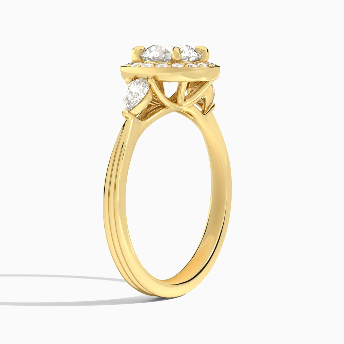 Round Halo Shaped Side Stone Lab Diamond Engagement Ring In 18K Yellow Gold, Angle View