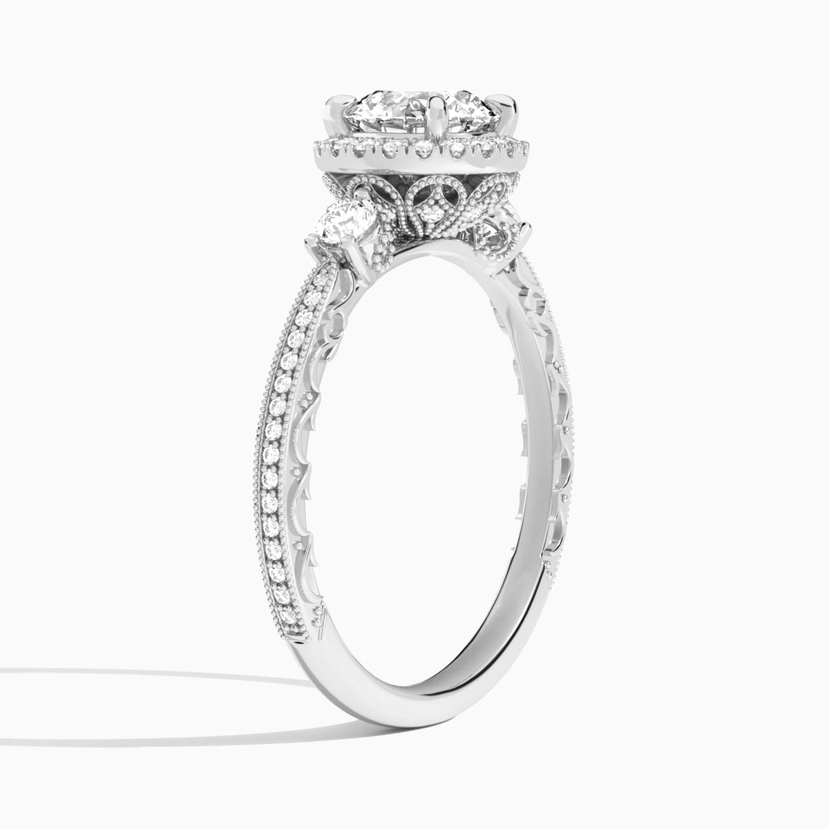 Round Luxe Three Stone Lab Diamond Engagement Ring In Platinum, Angle View
