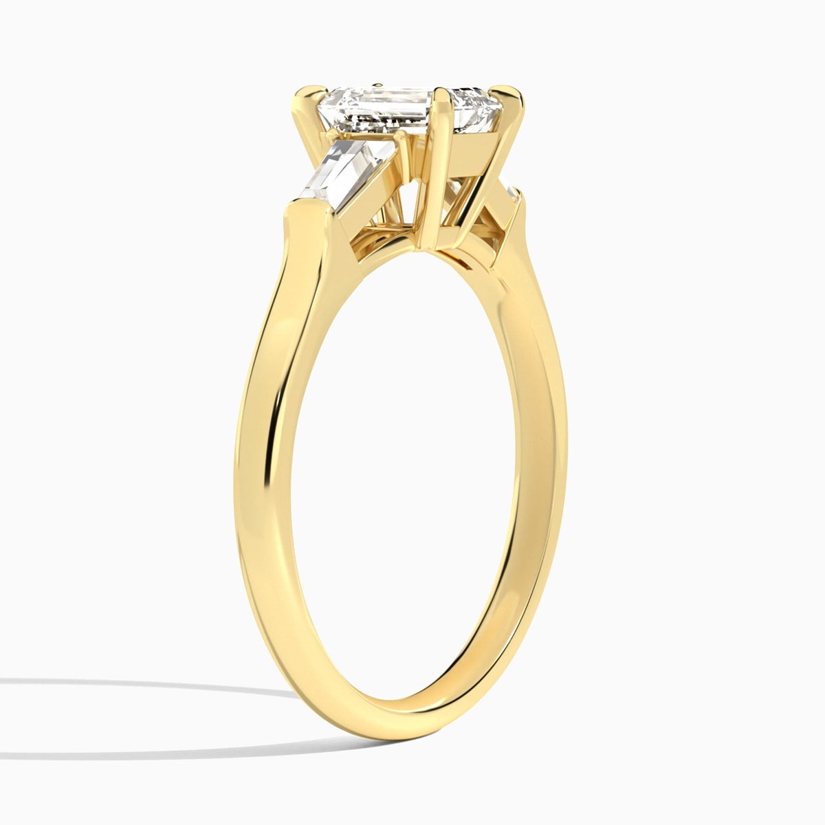 Emerald Timeless Trinity Lab Diamond Engagement Ring In 18K Yellow Gold, Angle View