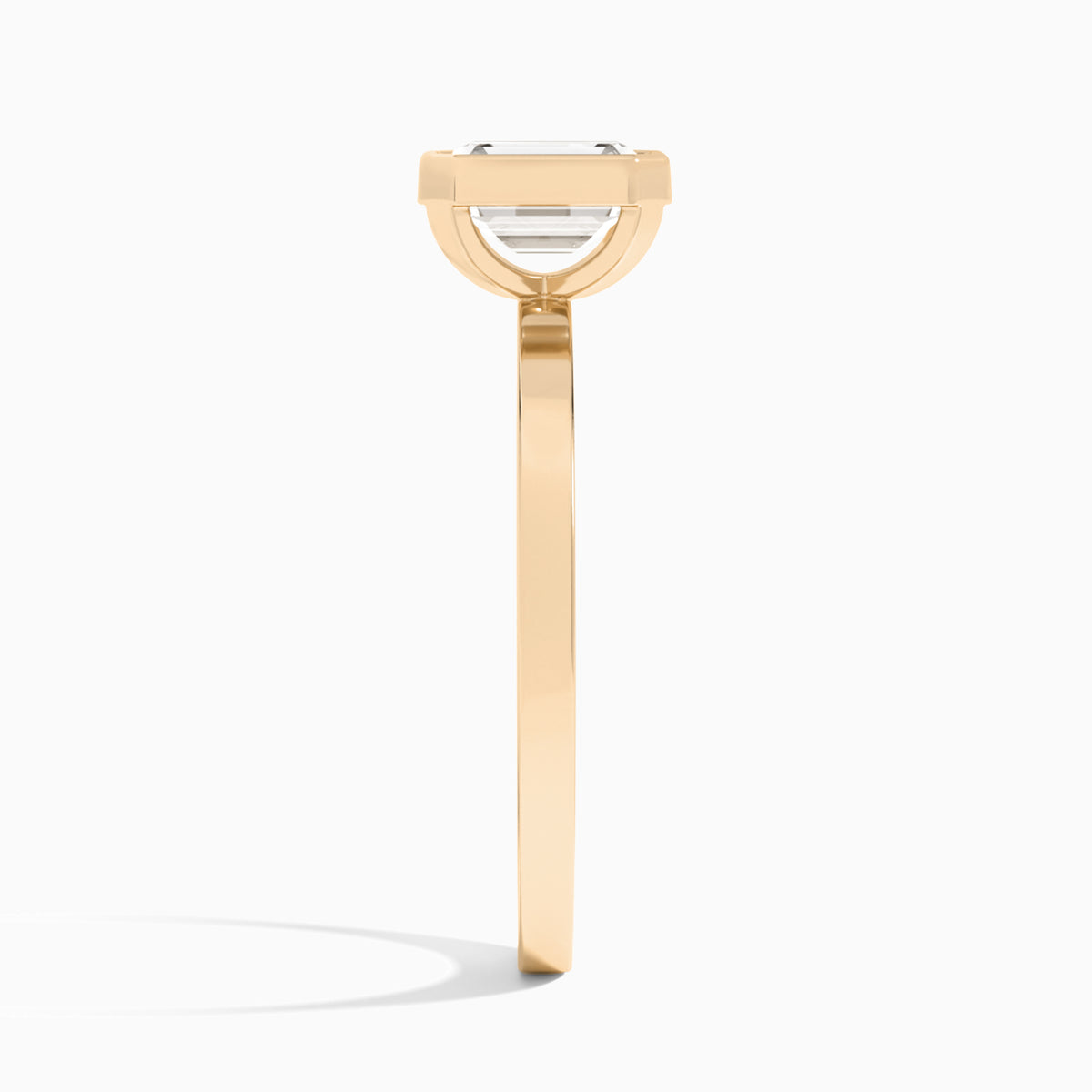 Emerald Vera Bezel Set Solitaire Diamond Engagement Ring In 14K Rose Gold, Side View