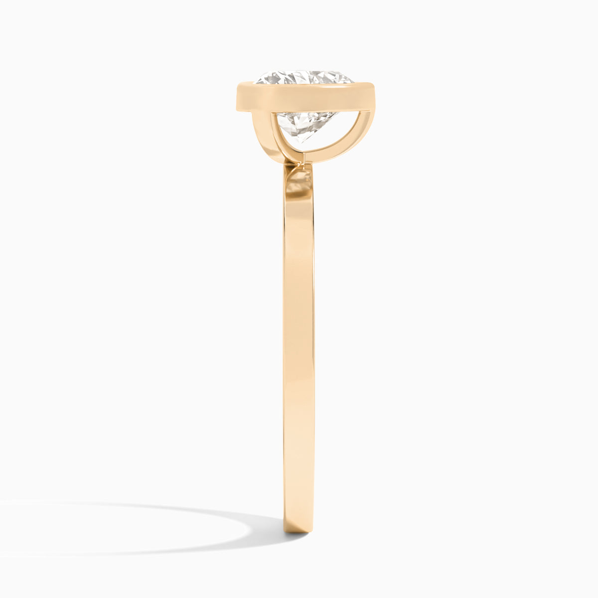 Heart Vera Bezel Set Solitaire Diamond Engagement Ring In 14K Rose Gold, Side View