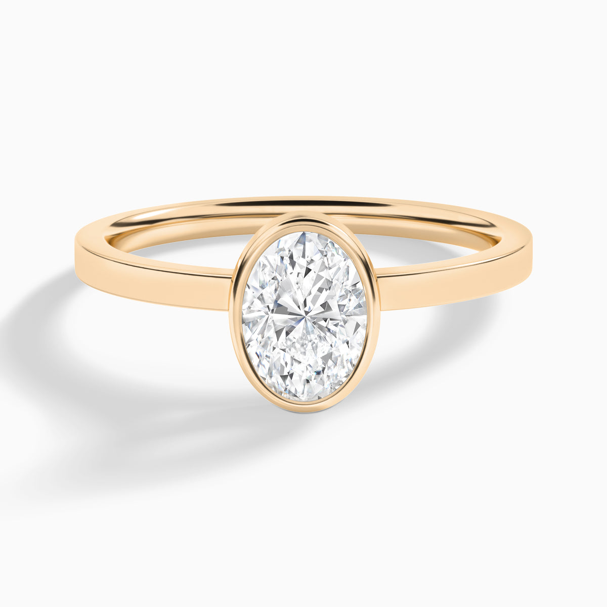 Oval Vera Bezel Set Solitaire Diamond Engagement Ring In 14K Rose Gold - Lucenjuri