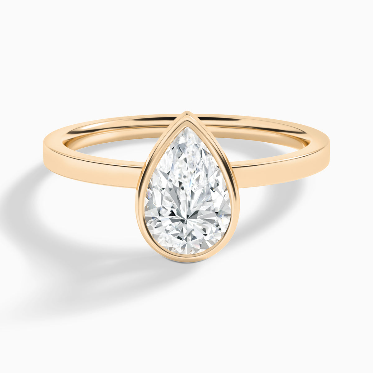 Pear Vera Bezel Set Solitaire Diamond Engagement Ring In 14K Rose Gold - Lucenjuri