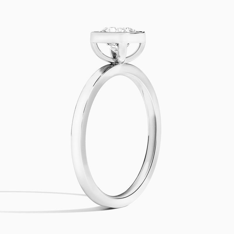 Cushion Vera Bezel Set Solitaire Diamond Engagement Ring In 18K White Gold, Angle View