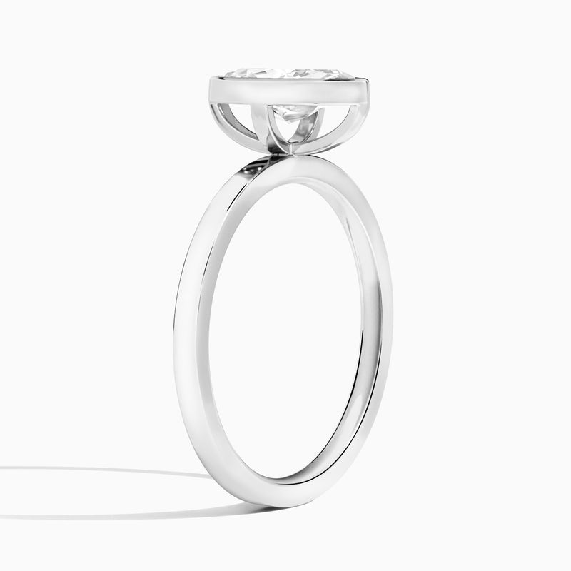 Marquise Vera Bezel Set Solitaire Diamond Engagement Ring In 18K White Gold, Angle View