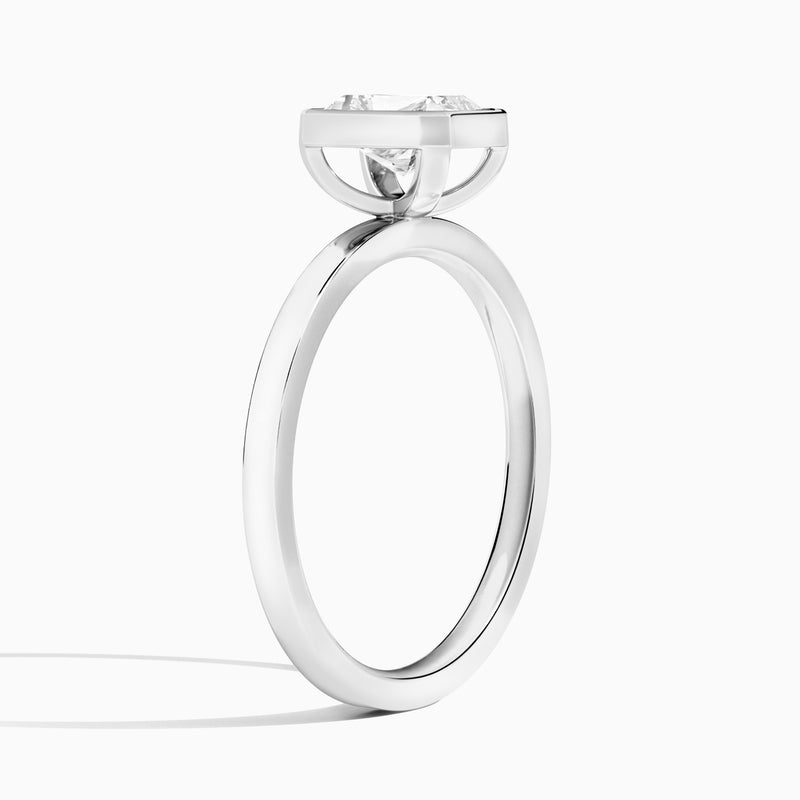 Radiant Vera Bezel Set Solitaire Diamond Engagement Ring In 18K White Gold, Angle View