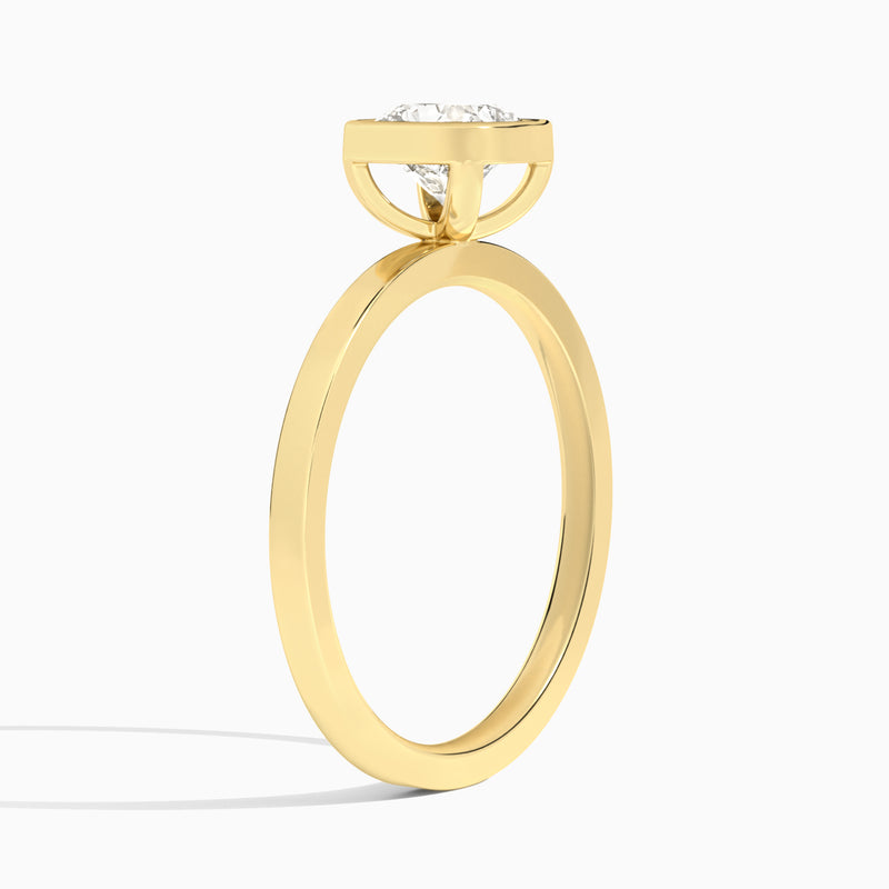 Cushion Vera Bezel Set Solitaire Diamond Engagement Ring In 18K Yellow Gold, Angle View