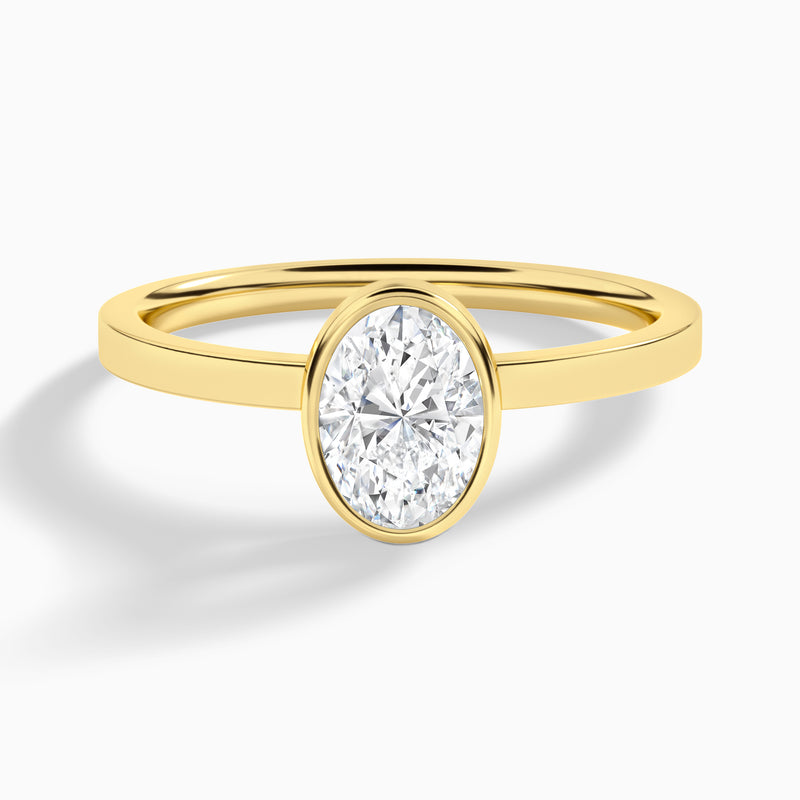 Oval Vera Bezel Set Solitaire Diamond Engagement Ring In 18K Yellow Gold - Lucenjuri