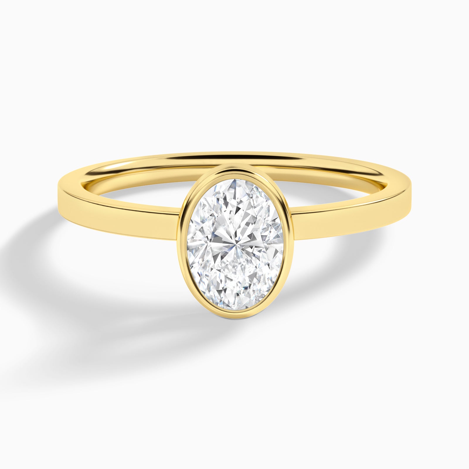 Oval Vera Bezel Set Solitaire Diamond Engagement Ring In 18K Yellow Gold - Lucenjuri