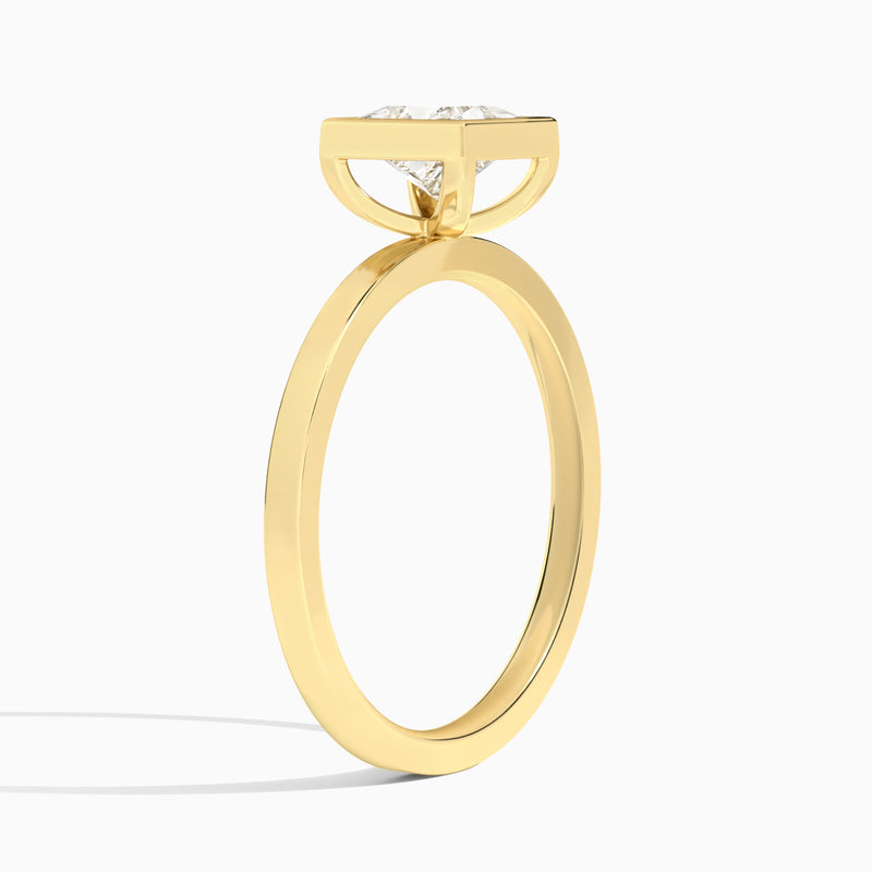 Princess Vera Bezel Set Solitaire Diamond Engagement Ring In 18K Yellow Gold, Angle View