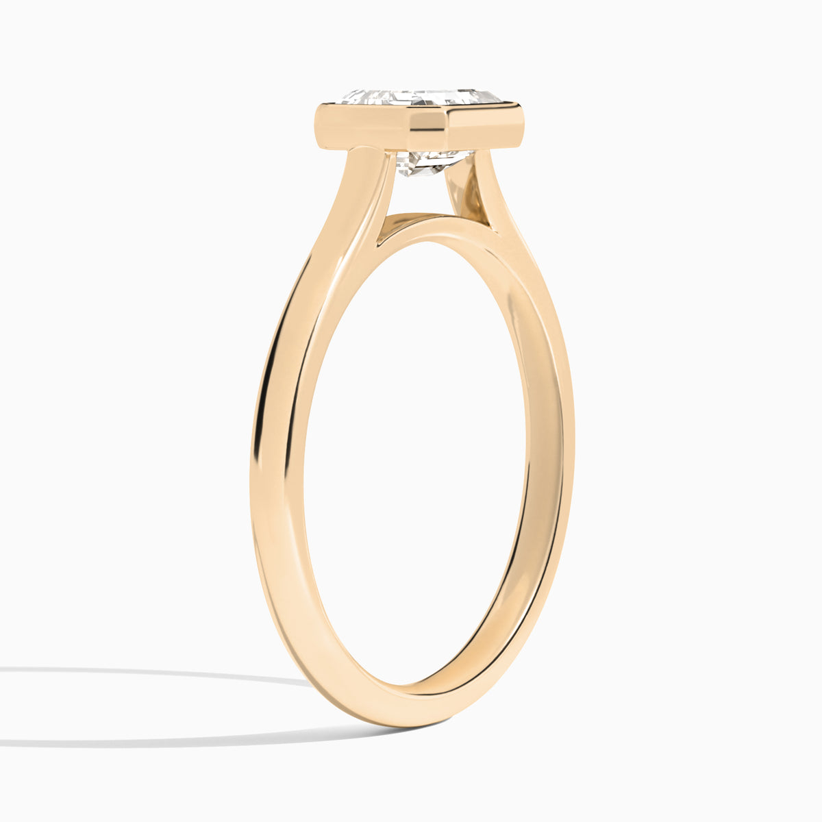 Emerald Alma East-West Bezel Solitaire Diamond Engagement Ring In 14K Rose Gold, Angle View