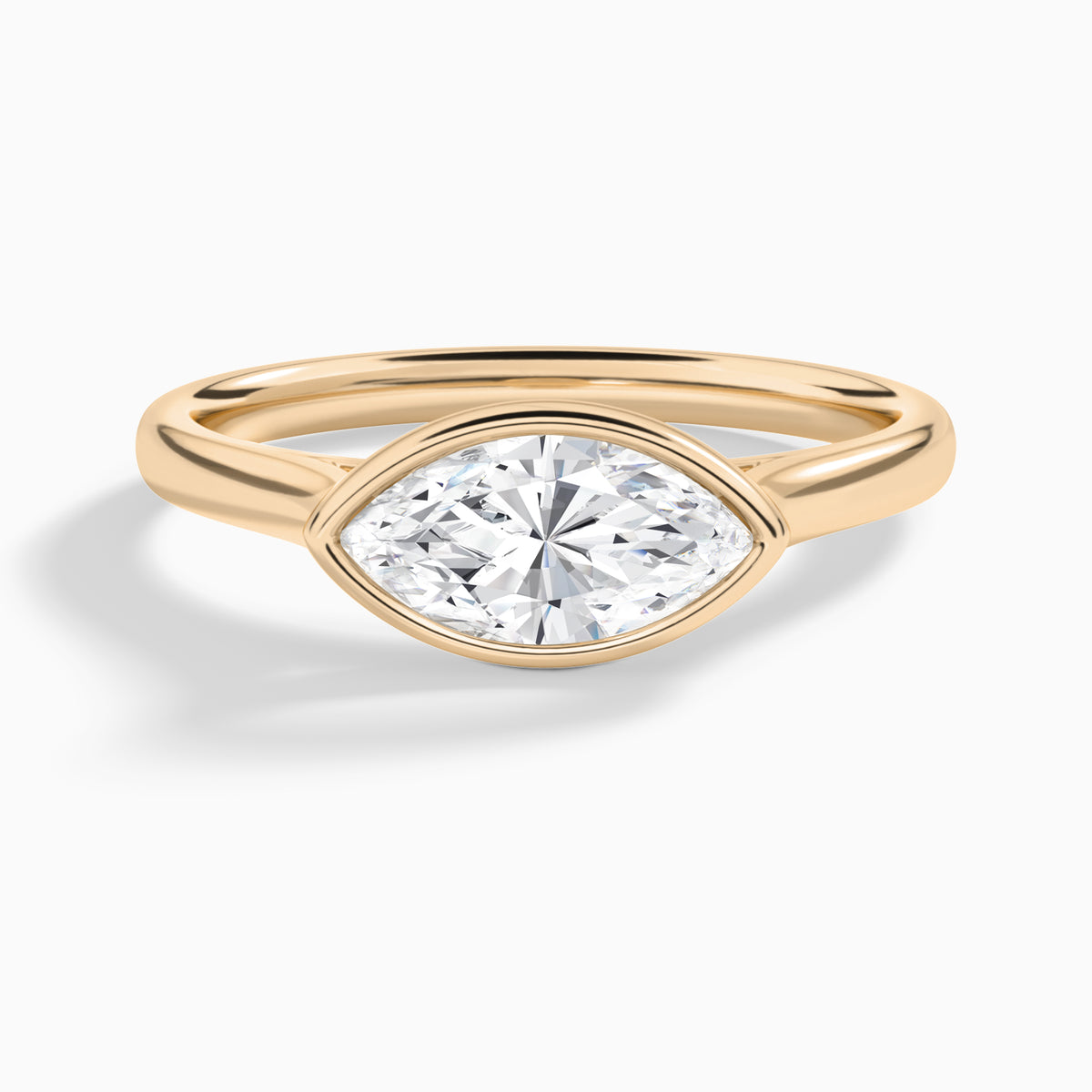 Marquise Alma East-West Bezel Solitaire Diamond Engagement Ring In 14K Rose Gold - Lucenjuri