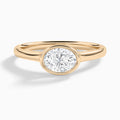 Oval Alma East-West Bezel Solitaire Diamond Engagement Ring In 14K Rose Gold - Lucenjuri