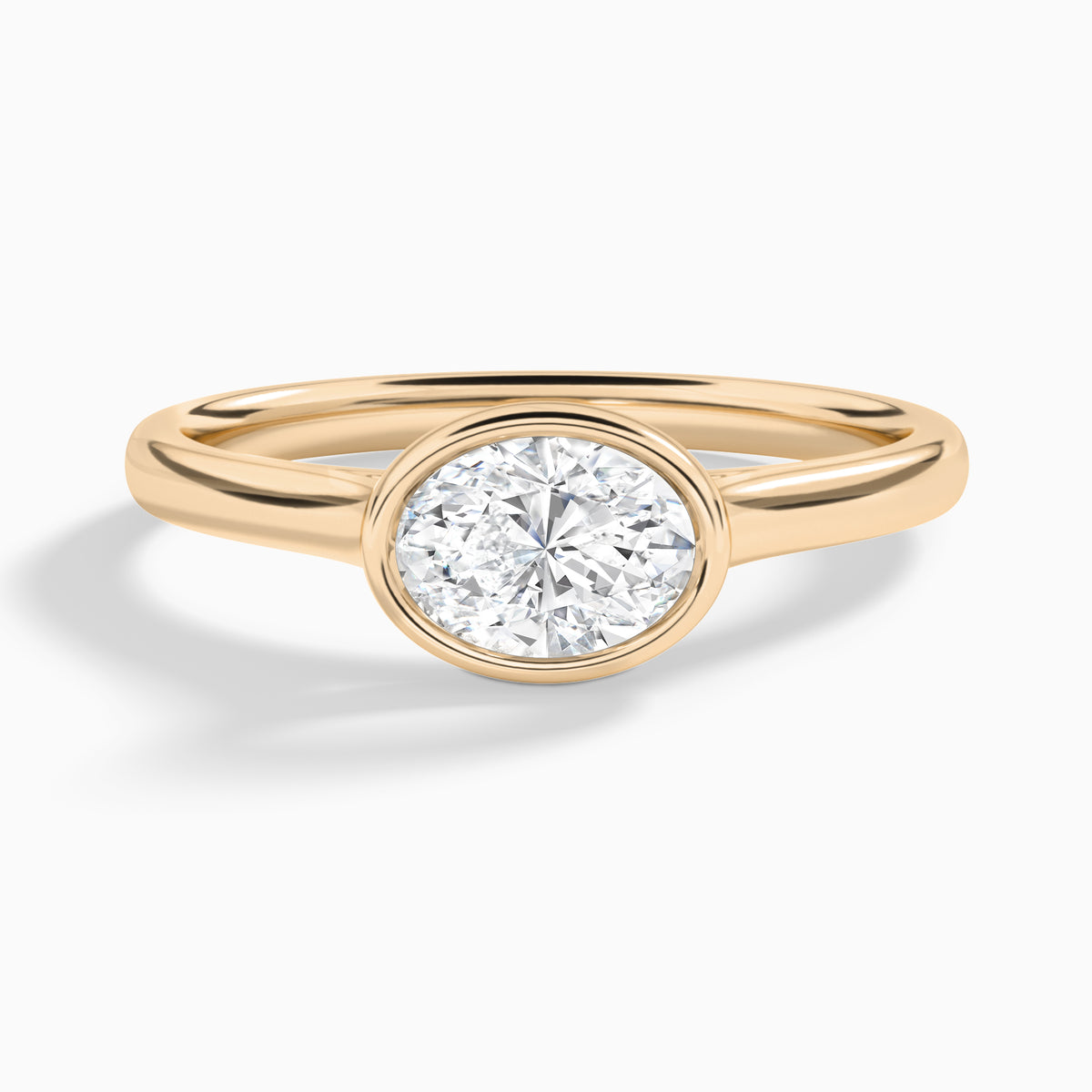 Oval Alma East-West Bezel Solitaire Diamond Engagement Ring In 14K Rose Gold - Lucenjuri