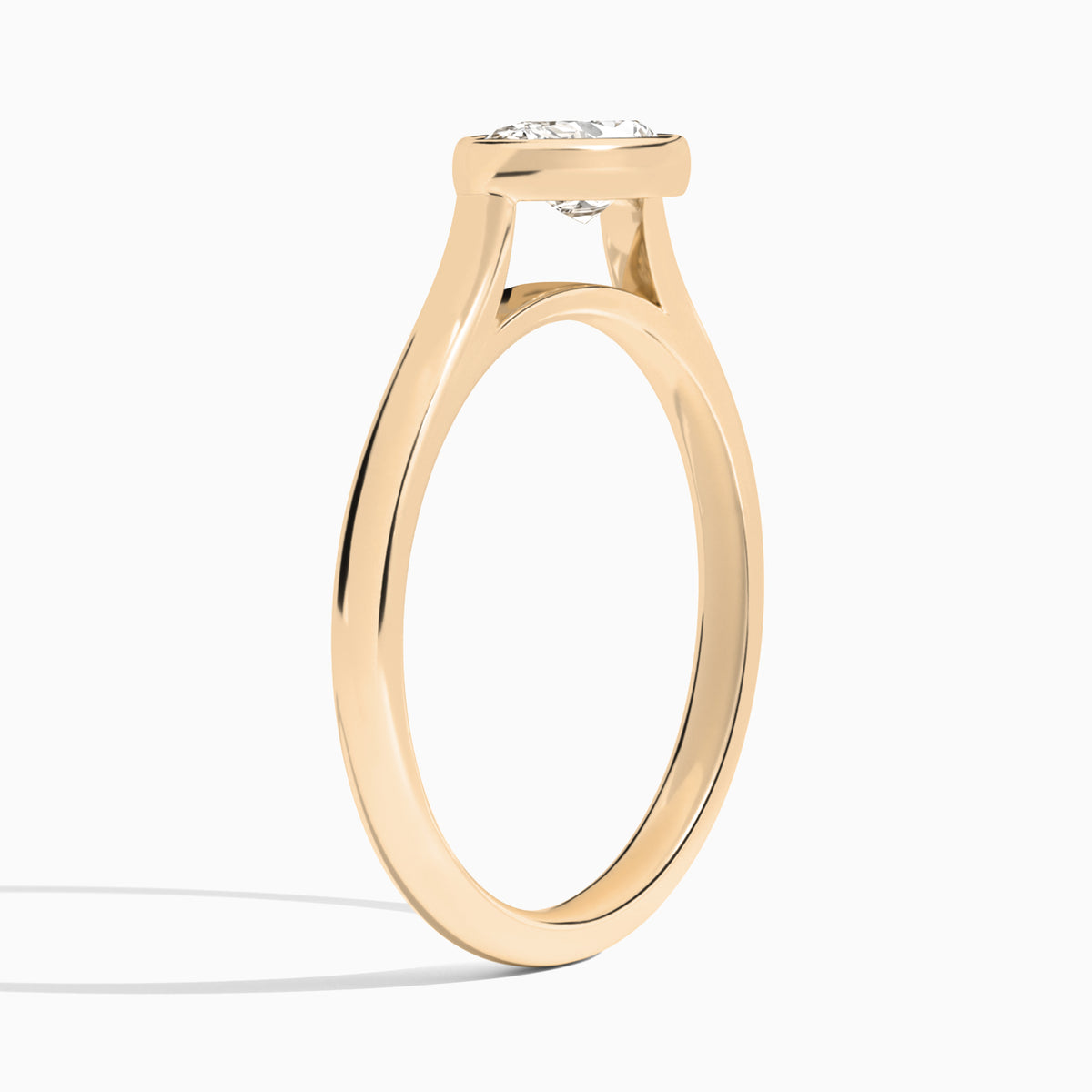 Pear Alma East-West Bezel Solitaire Diamond Engagement Ring In 14K Rose Gold, Angle View