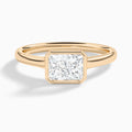 Radiant Alma East-West Bezel Solitaire Diamond Engagement Ring In 14K Rose Gold - Lucenjuri