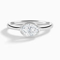 Oval Alma East-West Bezel Solitaire Diamond Engagement Ring In 18K White Gold - Lucenjuri